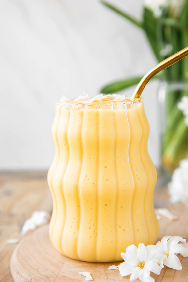 Creamy and Healthy Mango Banana Smoothie that's gluten free, dairy free, vegan, whole 30 and paleo approved!