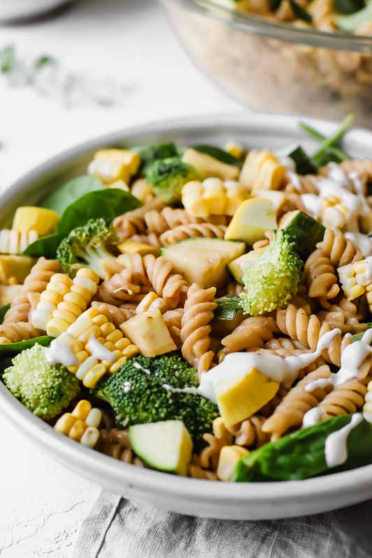 Close up of Barbecue Ranch Pasta Salad in a bowl.