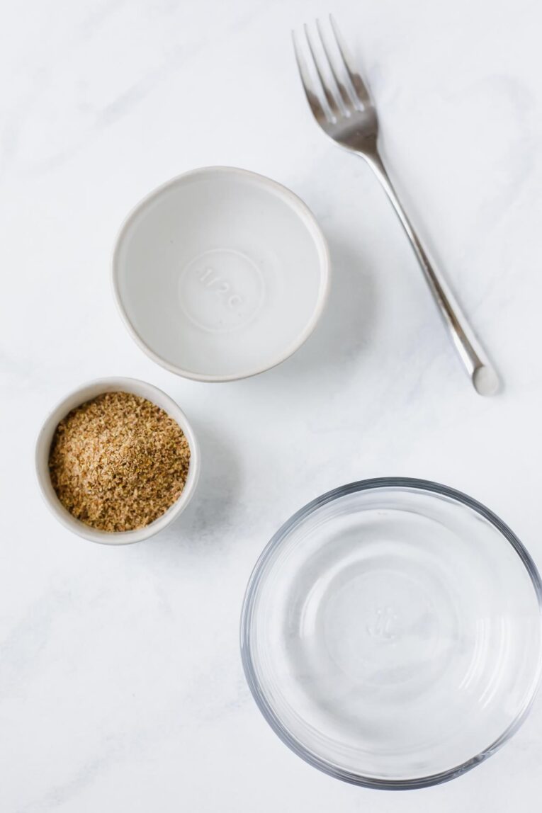 Ingredients for Easy Flax Egg Recipe on a white counter.