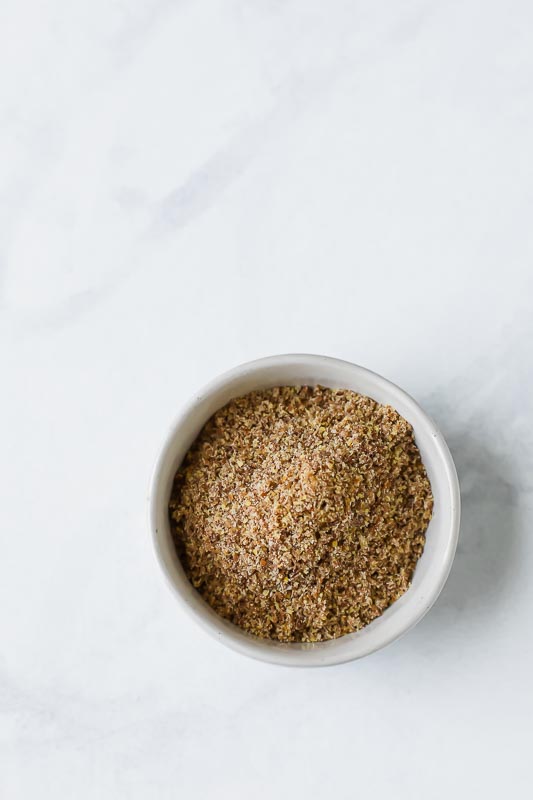 Flax seeds in a bowl, ground.