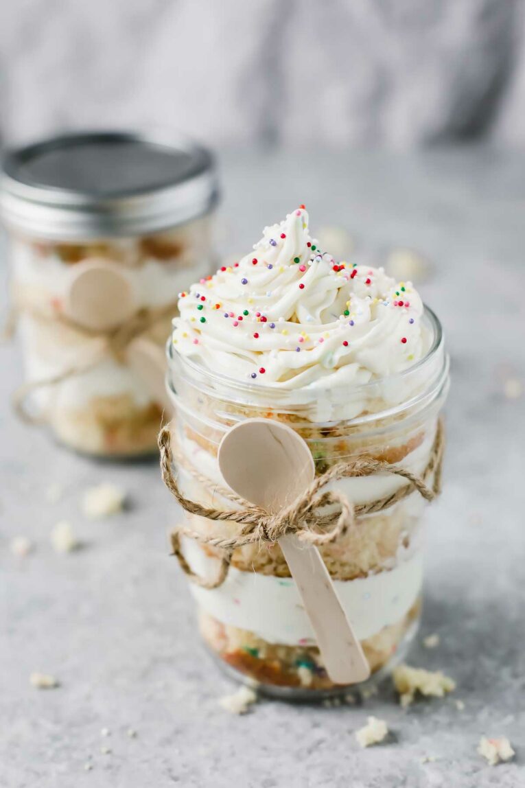 Birthday Cake In A Jar (Gift DIY) by wrapped with twine and a small wooden spoon.