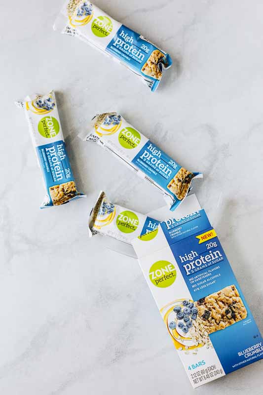 ZonePerfect High Protein Bars on a marble background