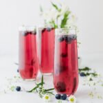 These Blueberry Thyme Mimosas are alcohol-free, low-sugar, and perfect for a refreshing weekend brunch drink!