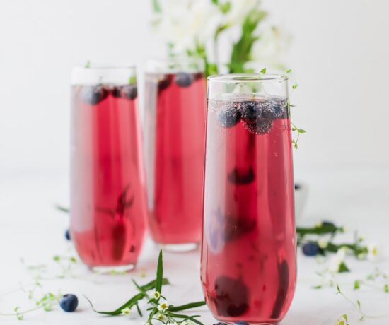 These Blueberry Thyme Mimosas are alcohol-free, low-sugar, and perfect for a refreshing weekend brunch drink!