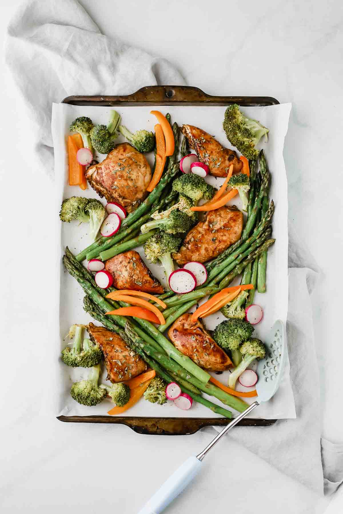 There's nothing like a good, easy sheet pan dinner recipe. Especially when it's this Honey Balsamic Chicken & Veggies recipe, which can also be made into a freezer meal! (Gluten-Free, Dairy-Free)