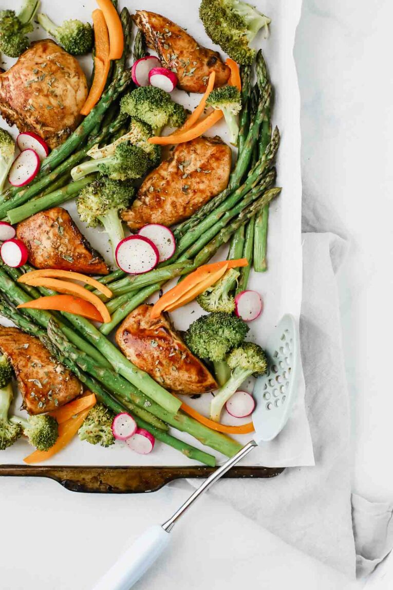 Overhead shot of Honey Balsamic Chicken & Veggies on a sheet pan.