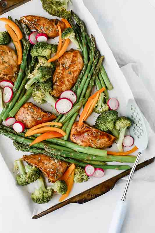 Overhead shot of Honey Balsamic Chicken & Veggies on a sheet pan.