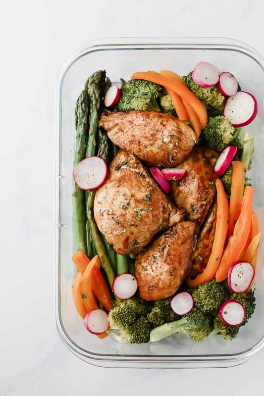 Overhead shot of Honey Balsamic Chicken & Veggies in a glass baking dish.