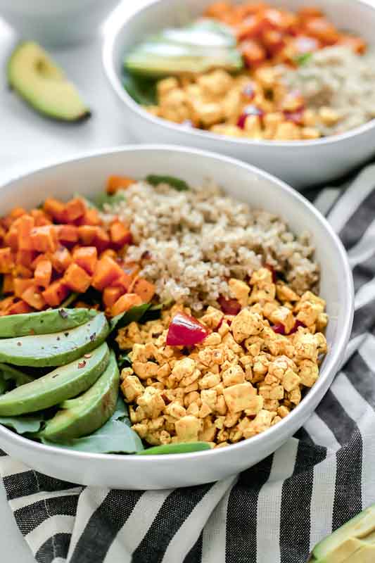 Side view of Tofu Scramble Vegan Breakfast Bowl served in a white bowl.