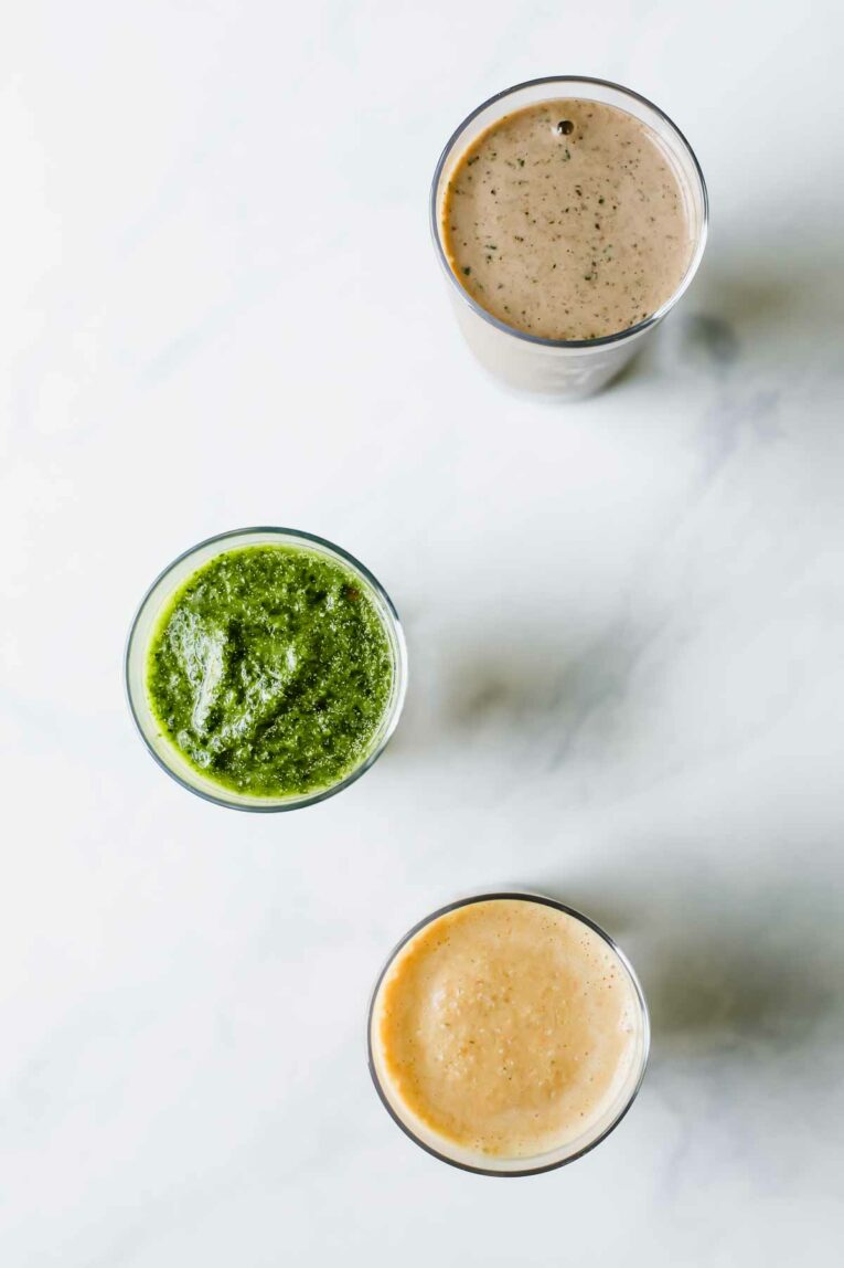 Easy Breakfasts w/ Smoothie Box (Honest Review) 3 colorful smoothies on a white marble table