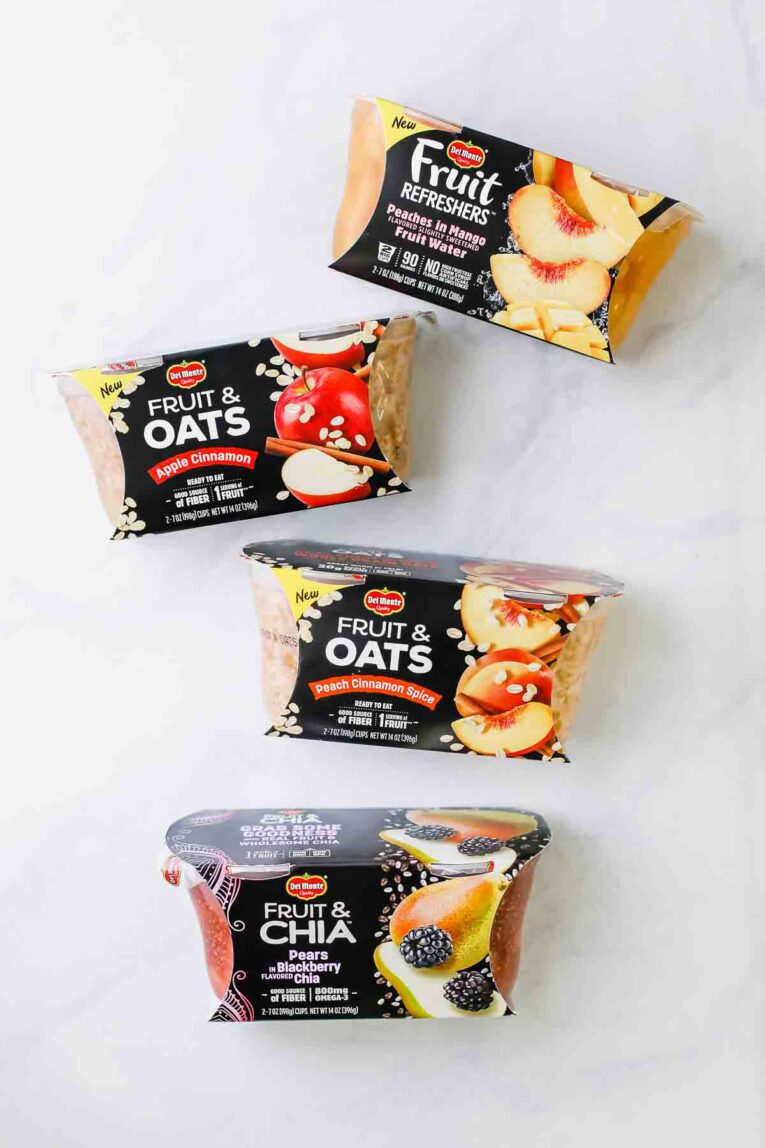 Del Monte fruit and oats containers on a countertop.