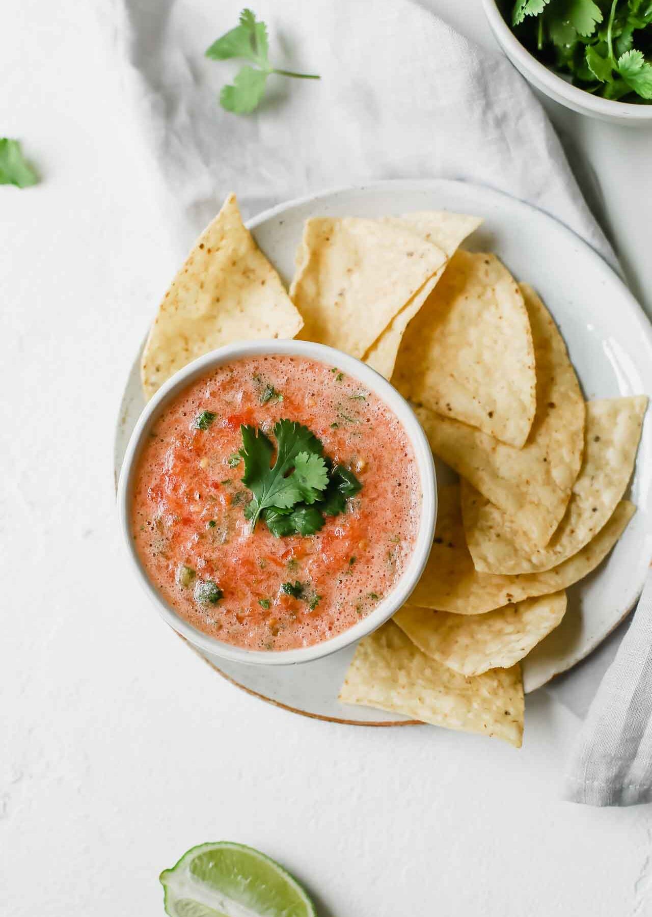 A top shot of a bowl of tomato salsa.