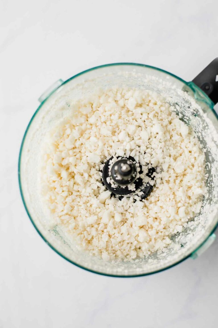 Savory, simple, and healthy. This 30-Minute Mexican Cauliflower Rice recipe is the best ever and is vegan, vegetarian, gluten-free, dairy-free, and paleo. It's perfect for dinner tonight! Cauliflower blended into rice in a food processor.