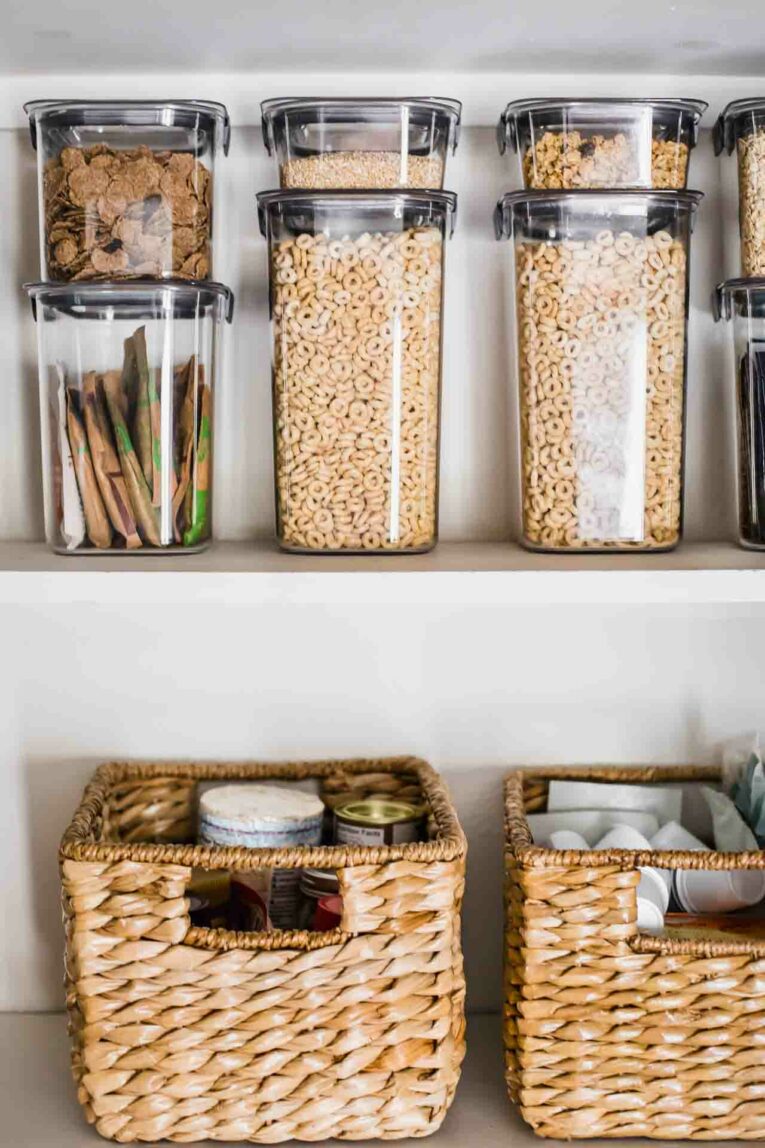 A shelf in a pantry with jars of food.