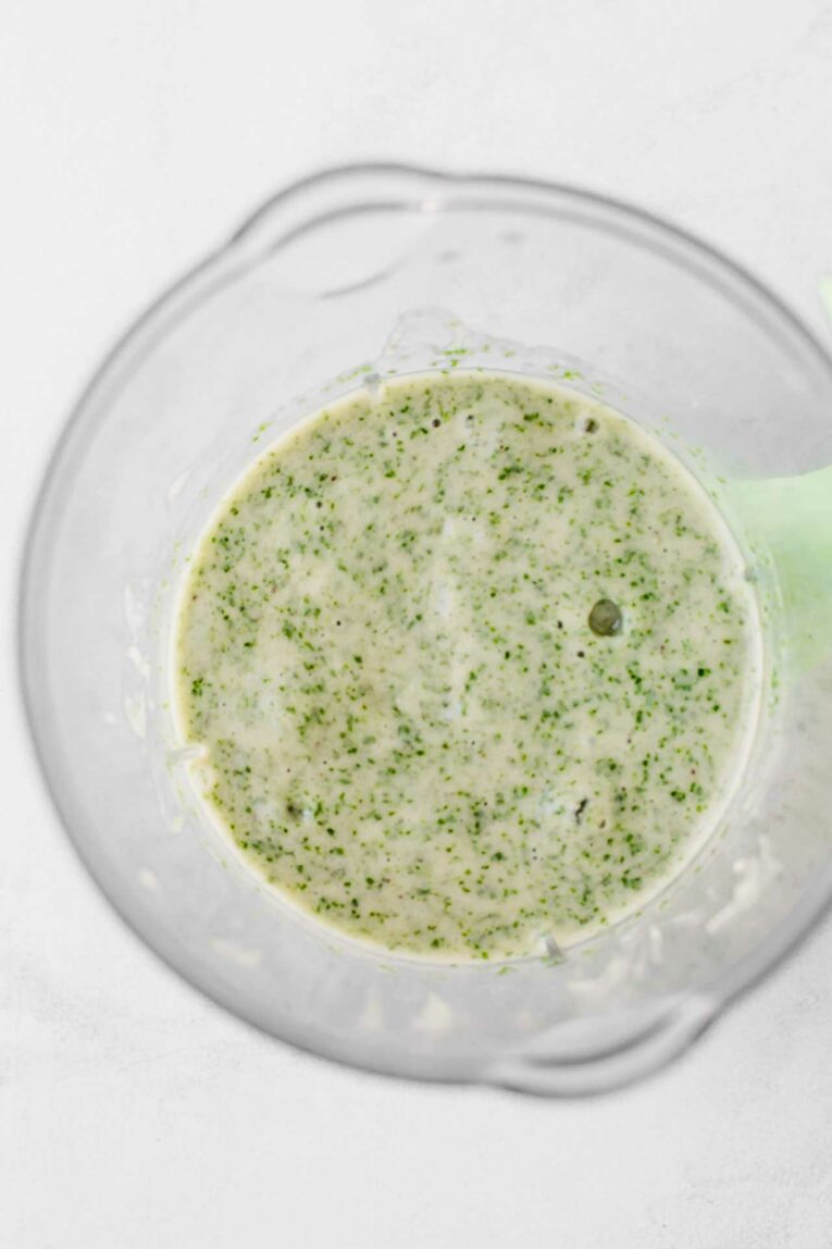 Banana kale oatmeal baby food made into a puree in a baby food maker.