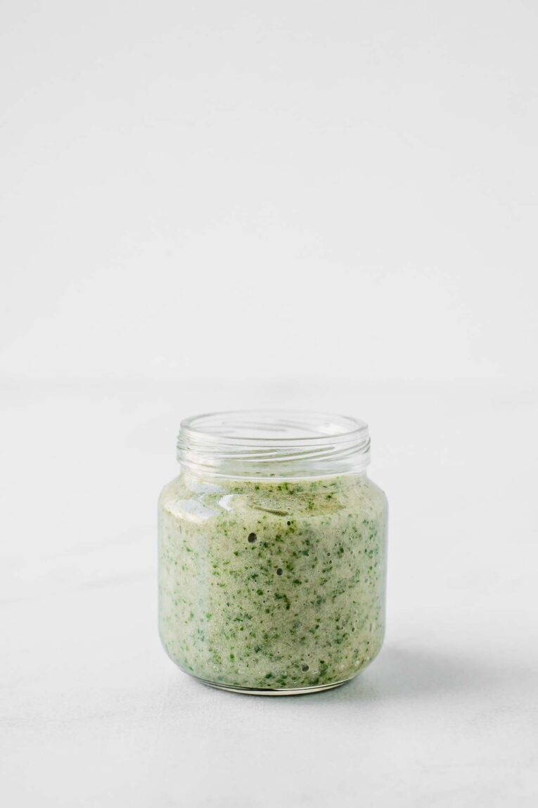 Banana Kale Oatmeal Baby Food Recipe in a baby food jar.
