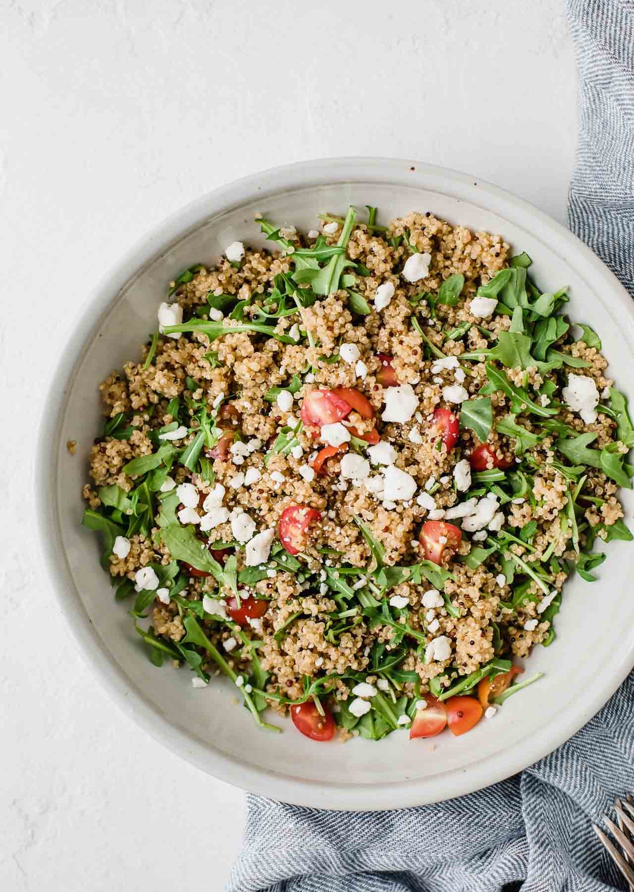 This Easy Quinoa Salad With Feta Cheese recipe is perfect for a healthy, everyday dinner, lunch, or cookout side dish. This vegetarian and gluten-free recipe is loaded with nutrition and delicious!
