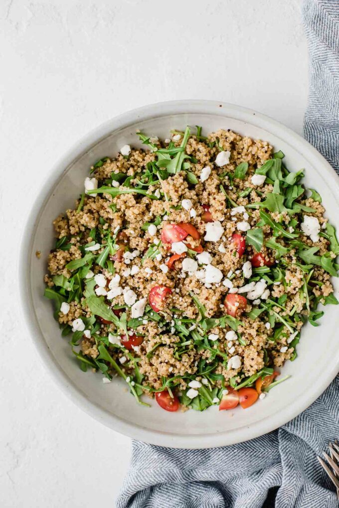 This Easy Quinoa Salad With Feta Cheese recipe is perfect for a healthy, everyday dinner, lunch, or cookout side dish. This vegetarian and gluten-free recipe is loaded with nutrition and delicious!