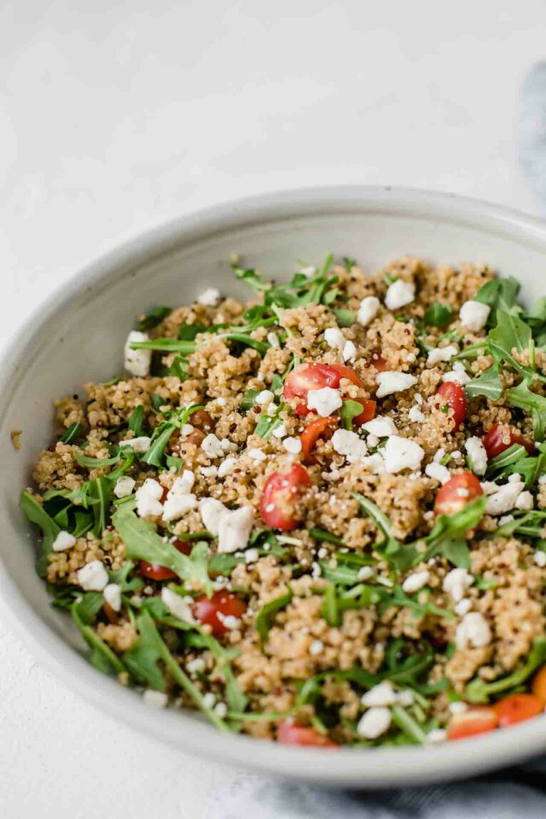 Easy-to-make quinoa salad in a white bowl.
