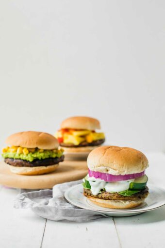Grilling season is finally here. Impress your guests with these easy veggie burgers served 3 different ways!