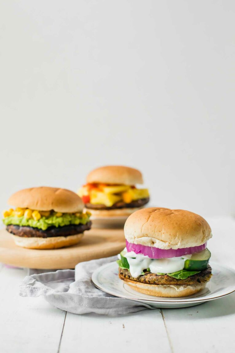 Grilling season is finally here. Impress your guests with these easy veggie burgers served 3 different ways!
