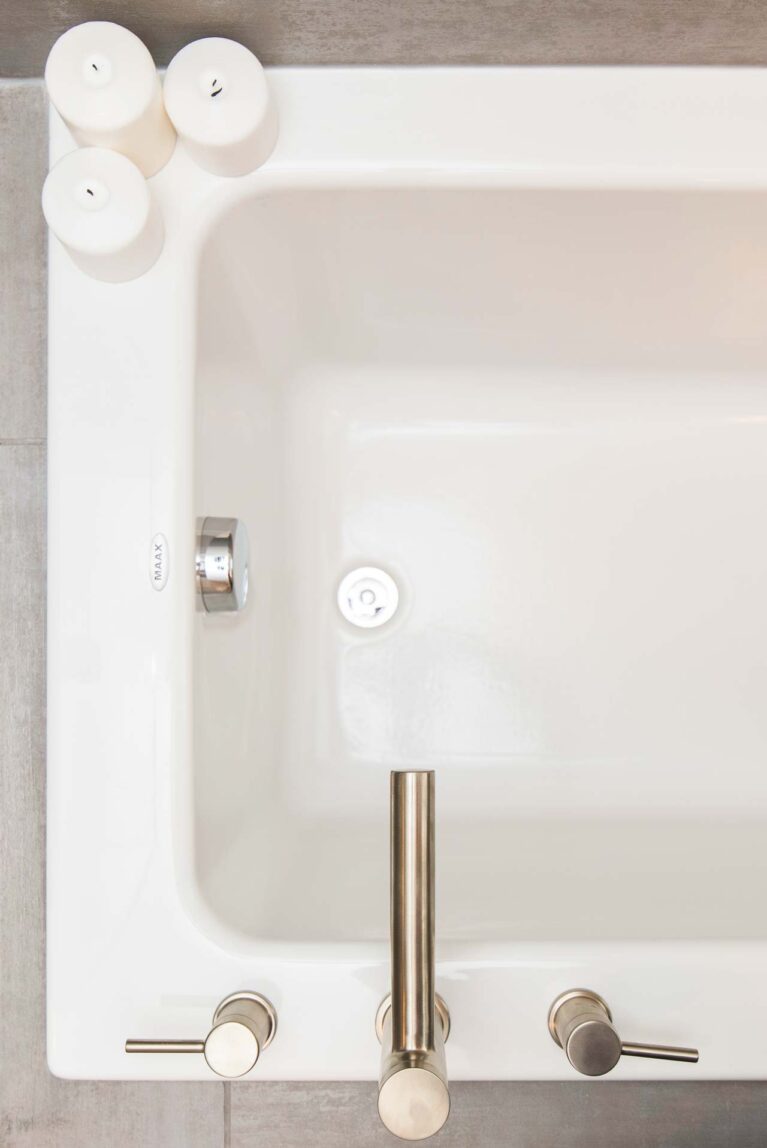 Overhead image of bathtub with candles