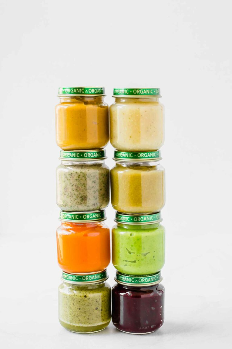 Baby food purees stacked in baby food jars