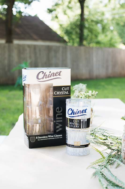 Chinet Cut Crystal wine glasses and cutlery.