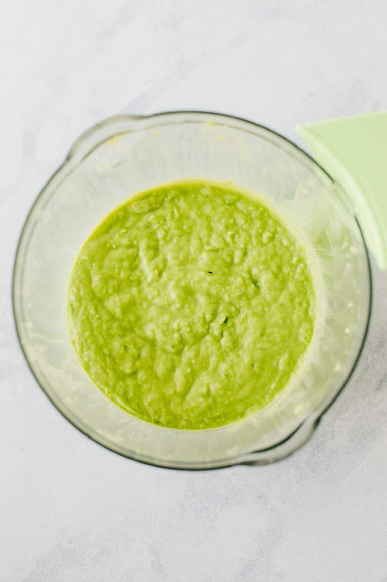 Peas & Avocado Baby Food pureed in a baby food maker.