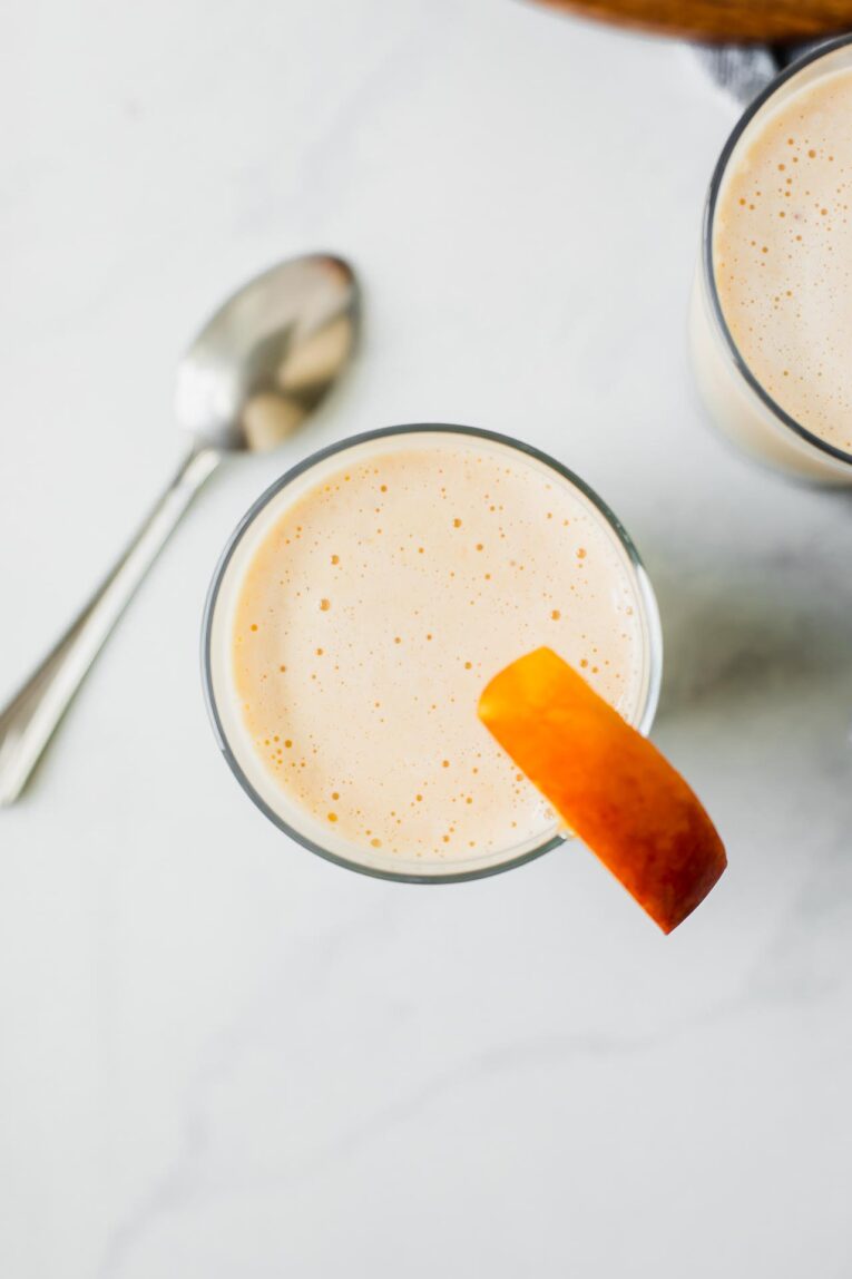 Top shot of peach yogurt smoothie.