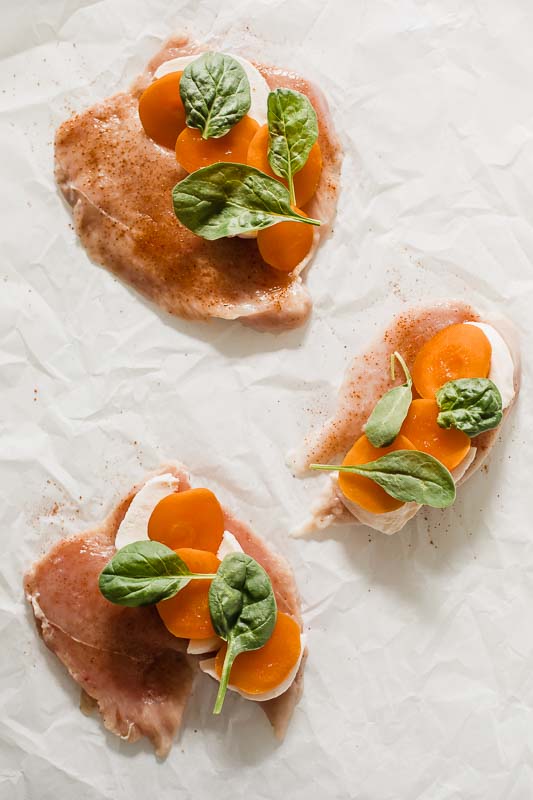 Butterflied chicken breast stuffed with mozzarella, apricot, and spinach.