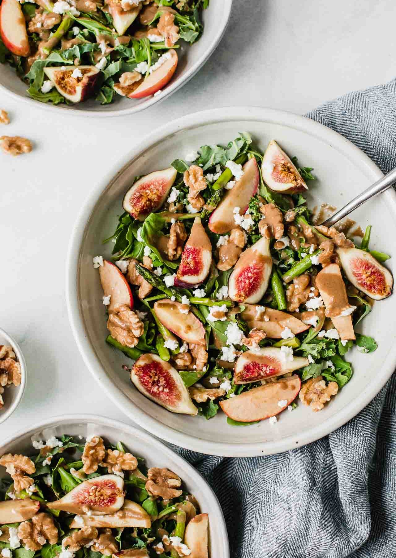 Fig & Goat Cheese Salad in a bowl with a fork.