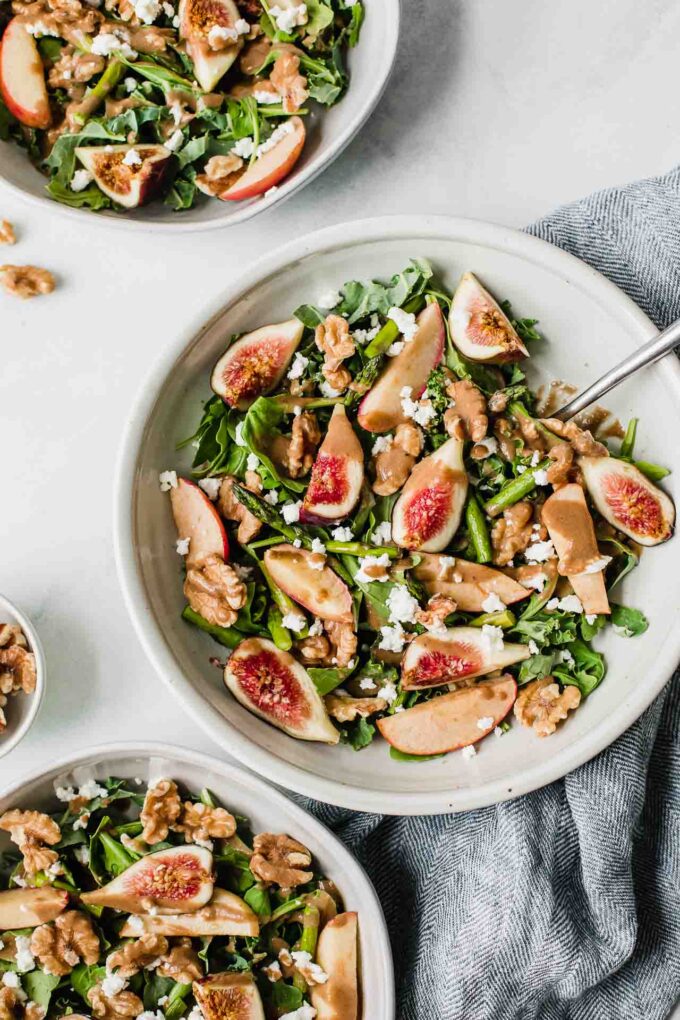 Fig & Goat Cheese Salad in a bowl with a fork.
