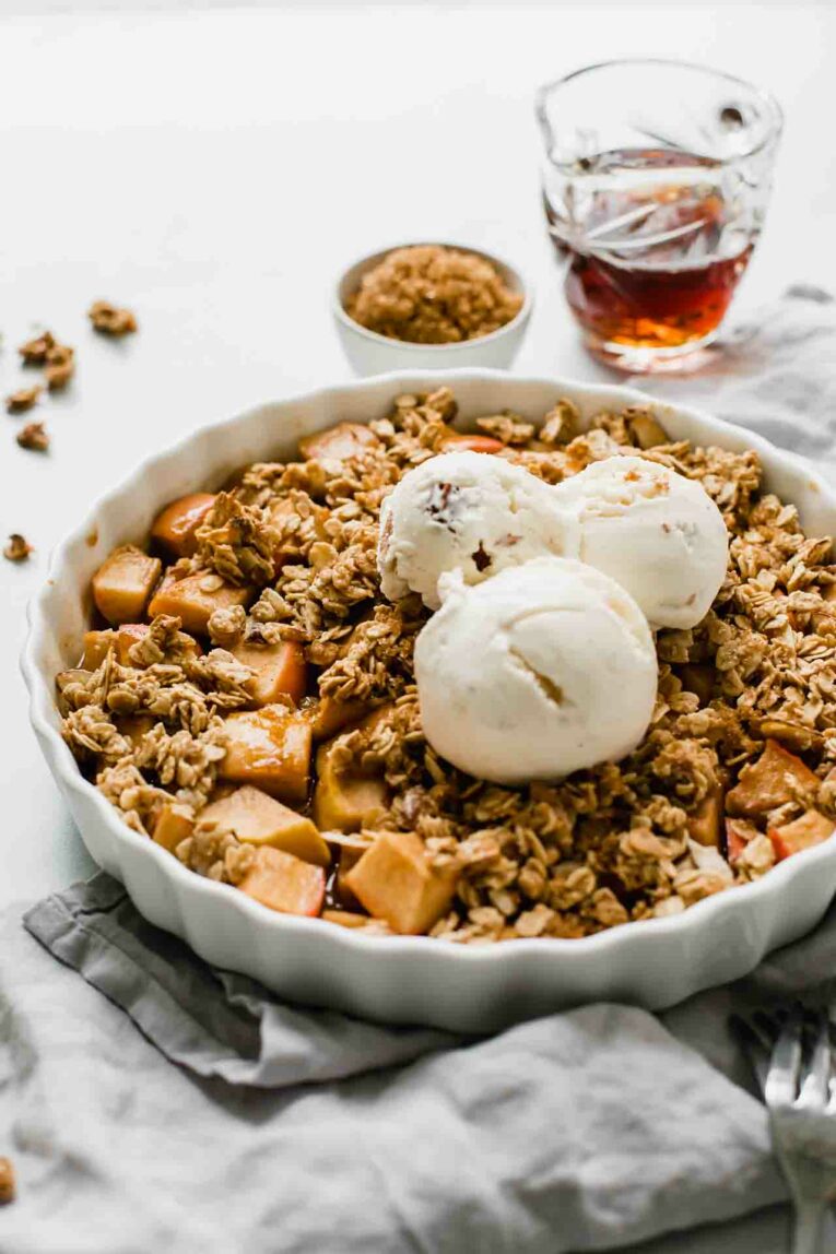 Angled shot of Healthy Apple Crisp in a baking dish.
