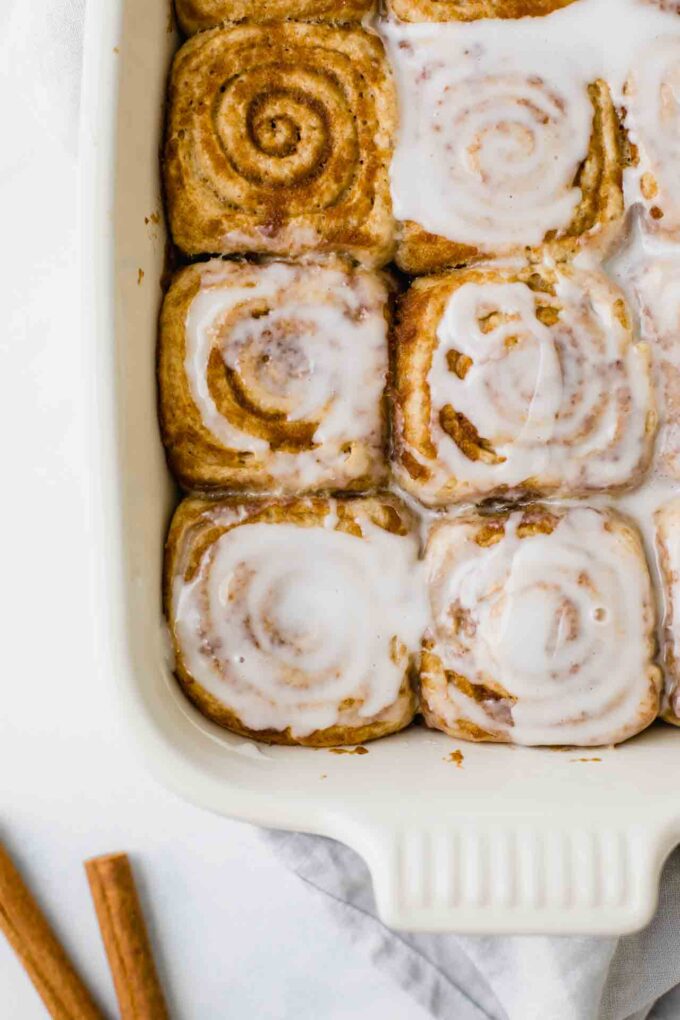 Close up of Vegan Cinnamon Rolls in a baking dish.