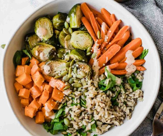 Fall Harvest Bowls recipe on a marble background.