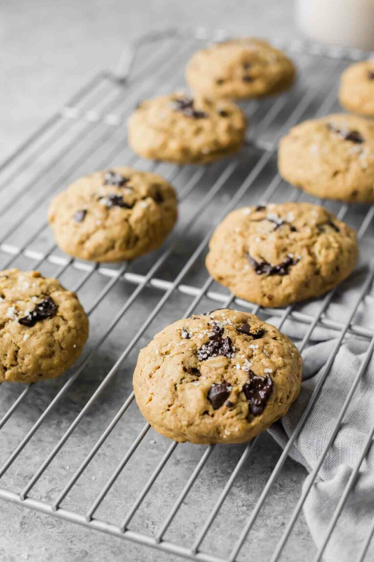 Angled shot of Healthy Oatmeal Chocolate Chip Cookies on a cooling rack.