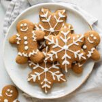 Soft, healthy gingerbread cookies on a white plate with a napkin in the background.