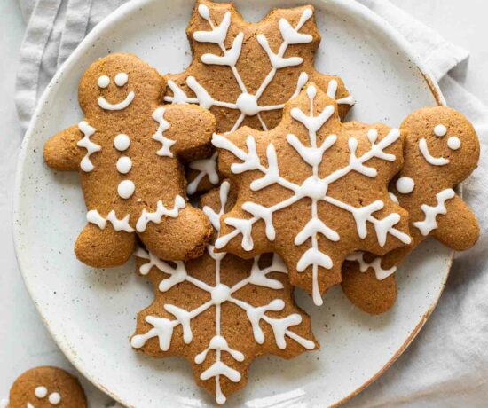 Soft, healthy gingerbread cookies on a white plate with a napkin in the background.