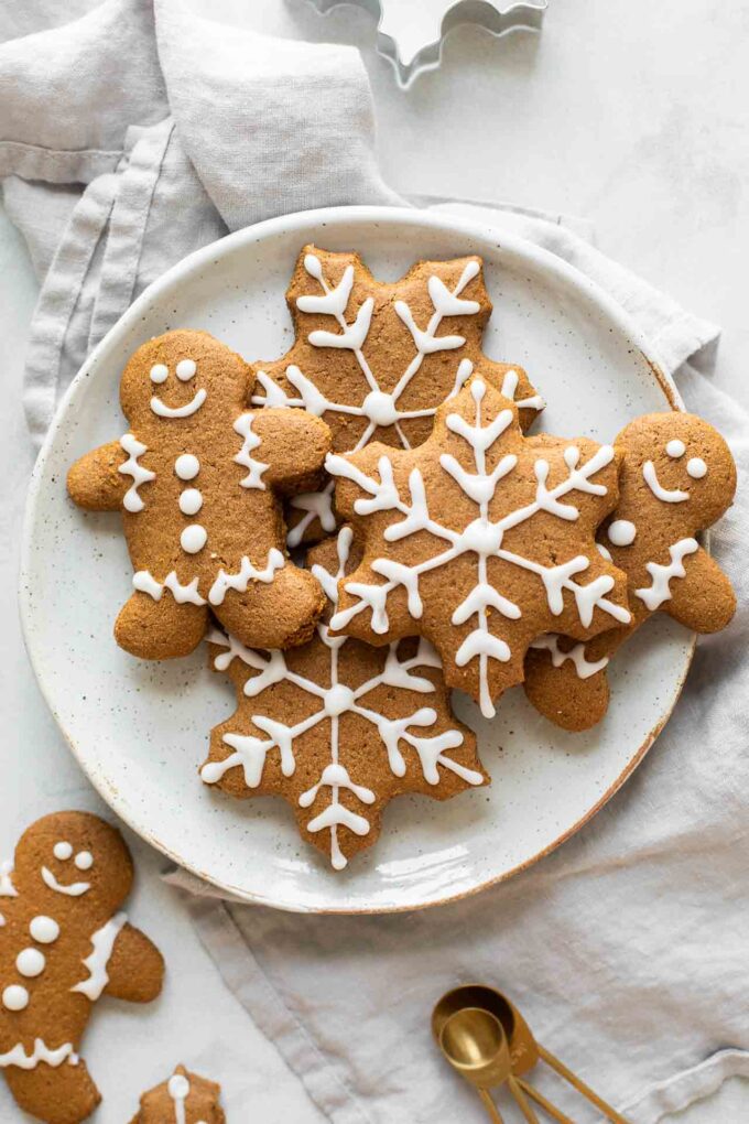Soft, healthy gingerbread cookies on a white plate with a napkin in the background.