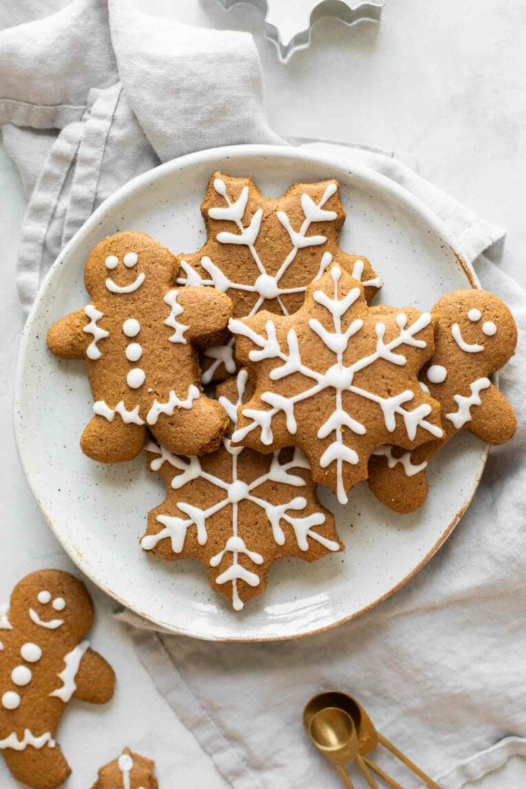 Soft, healthy gingerbread cookies on a white plate with a napkin in the background.