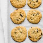 Close up of almond flour chocolate chip cookies on a baking sheet.