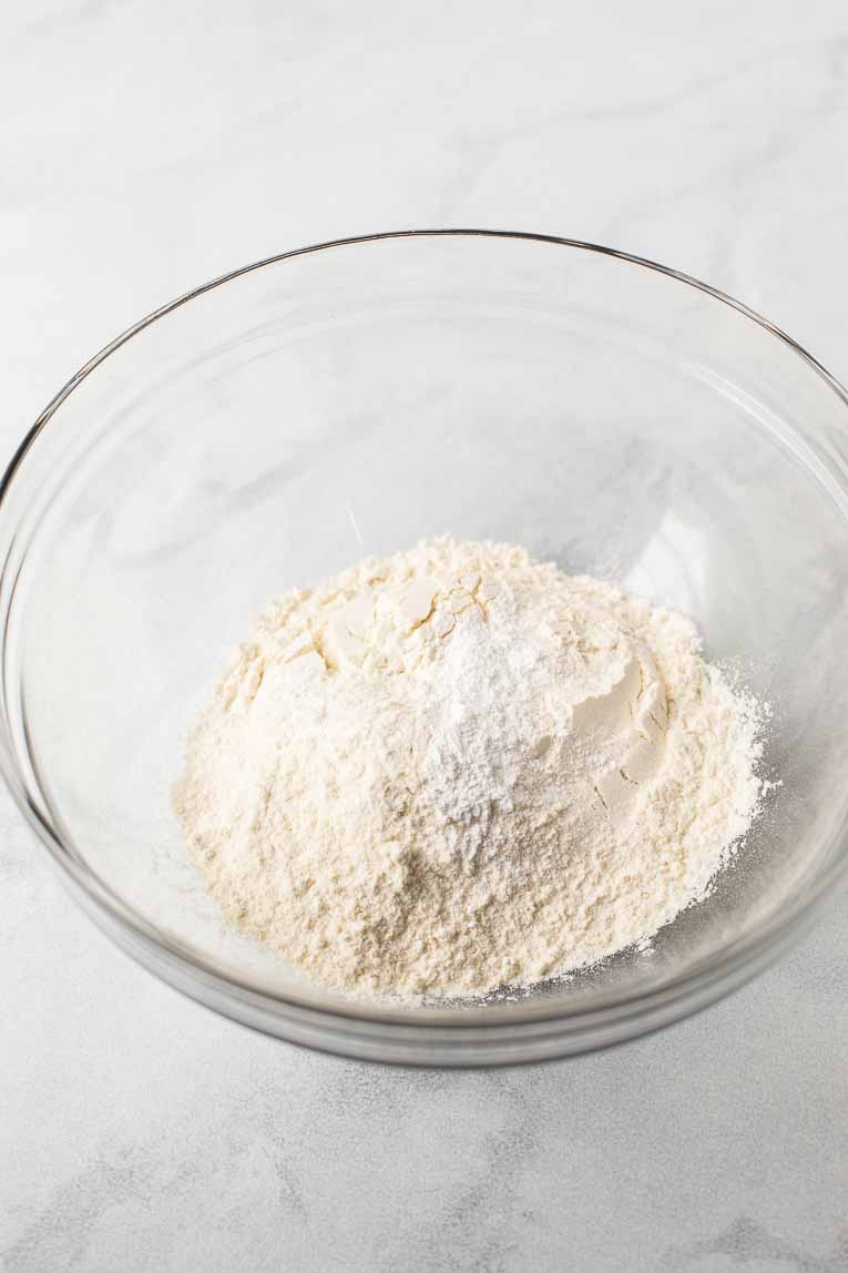 Flour, baking powder, and salt in a large mixing bowl.