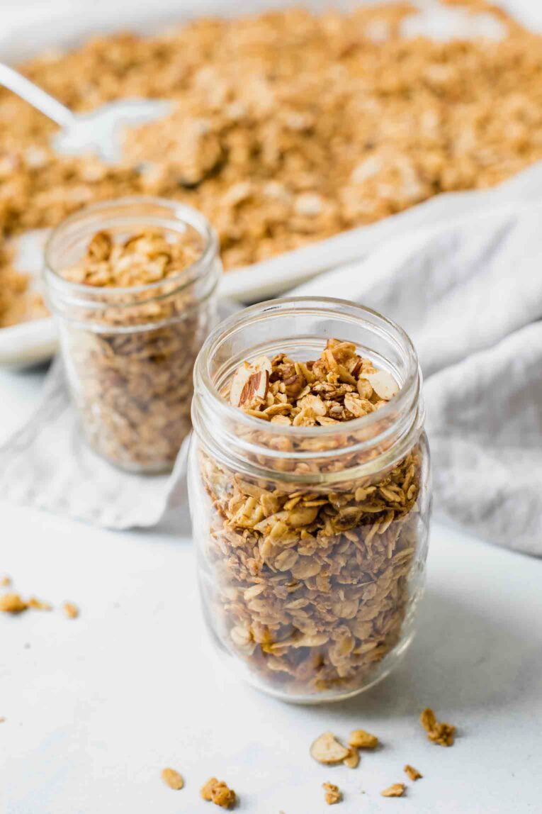 Angled shot of granola in a mason jar.