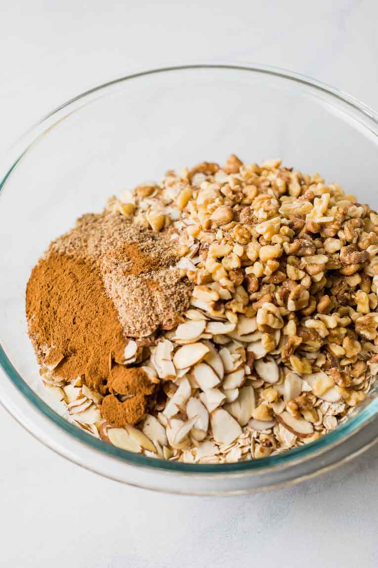 Dry ingredients for Homemade Granola in a mixing bowl.