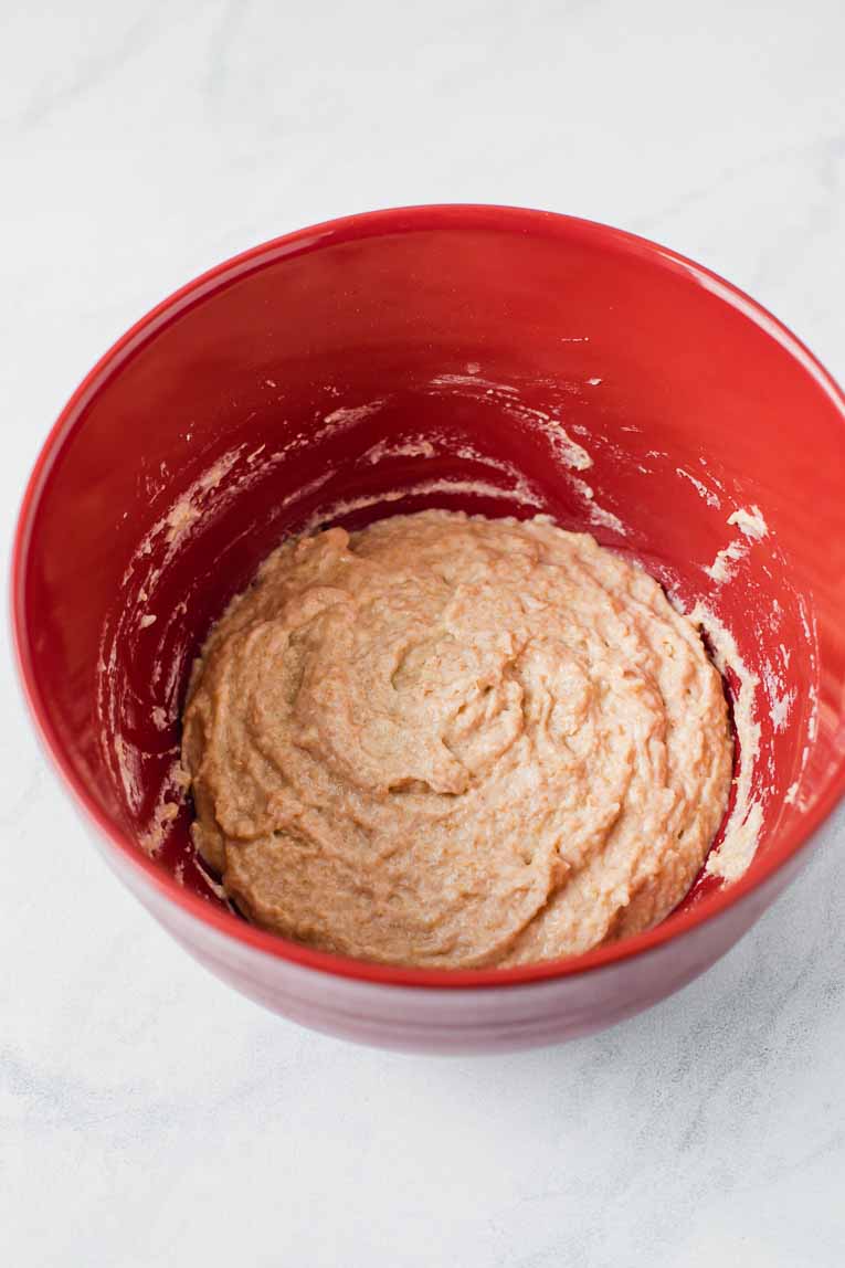 Sourdough starter with flour, milk, and sugar in a mixing bowl.