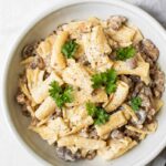 Top shot of Creamy Mushroom Sausage Rigatoni in a white bowl.