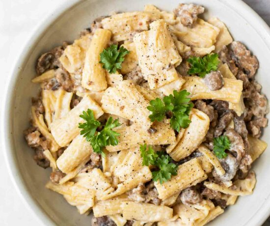 Top shot of Creamy Mushroom Sausage Rigatoni in a white bowl.