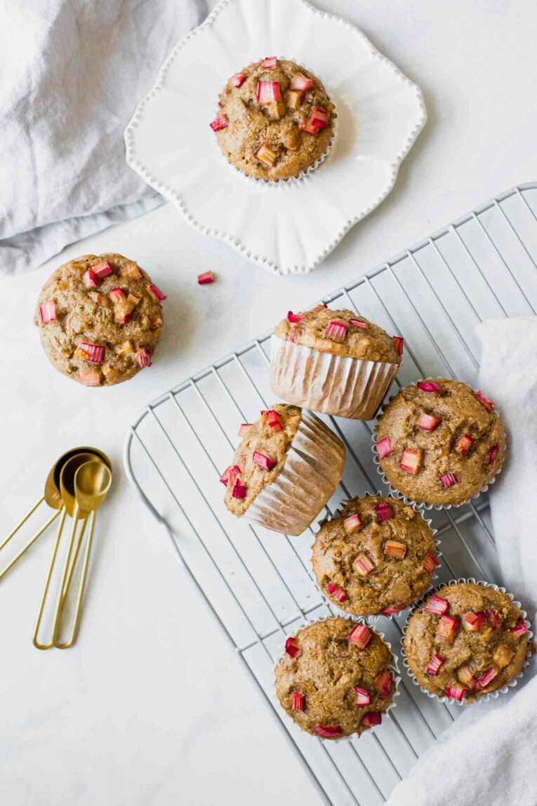 Top shot of Gluten-Free Healthy Rhubarb Muffins on a cooling rack.
