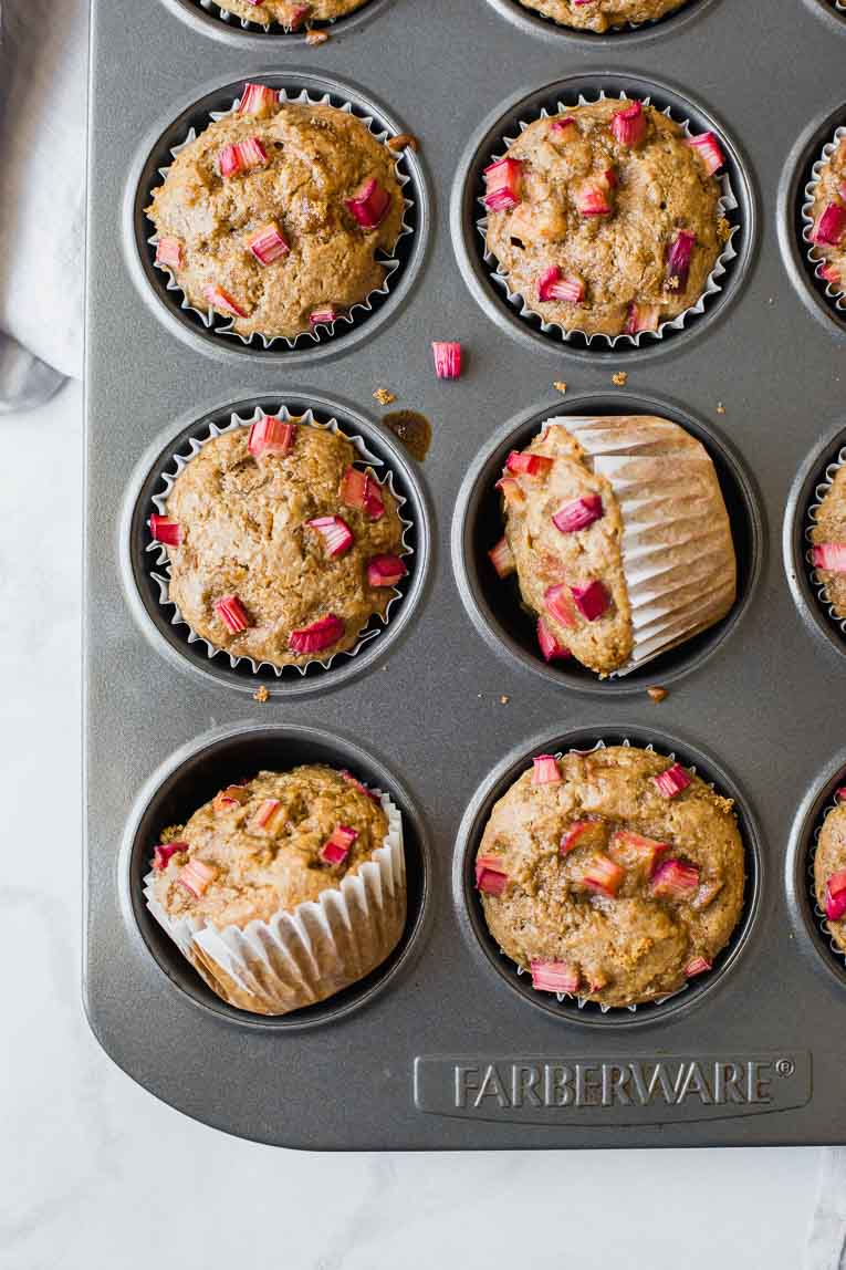 Baked Gluten-Free Healthy Rhubarb Muffins in a muffin pan.